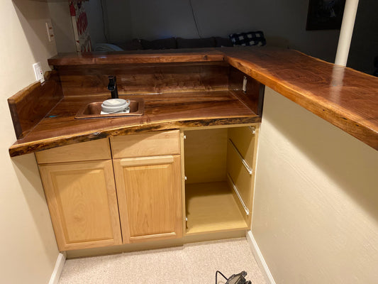 custom live edge black walnut bar top with epoxy