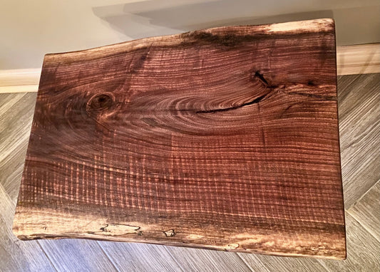 This smaller but stunning curly and spalted black walnut live edge end table